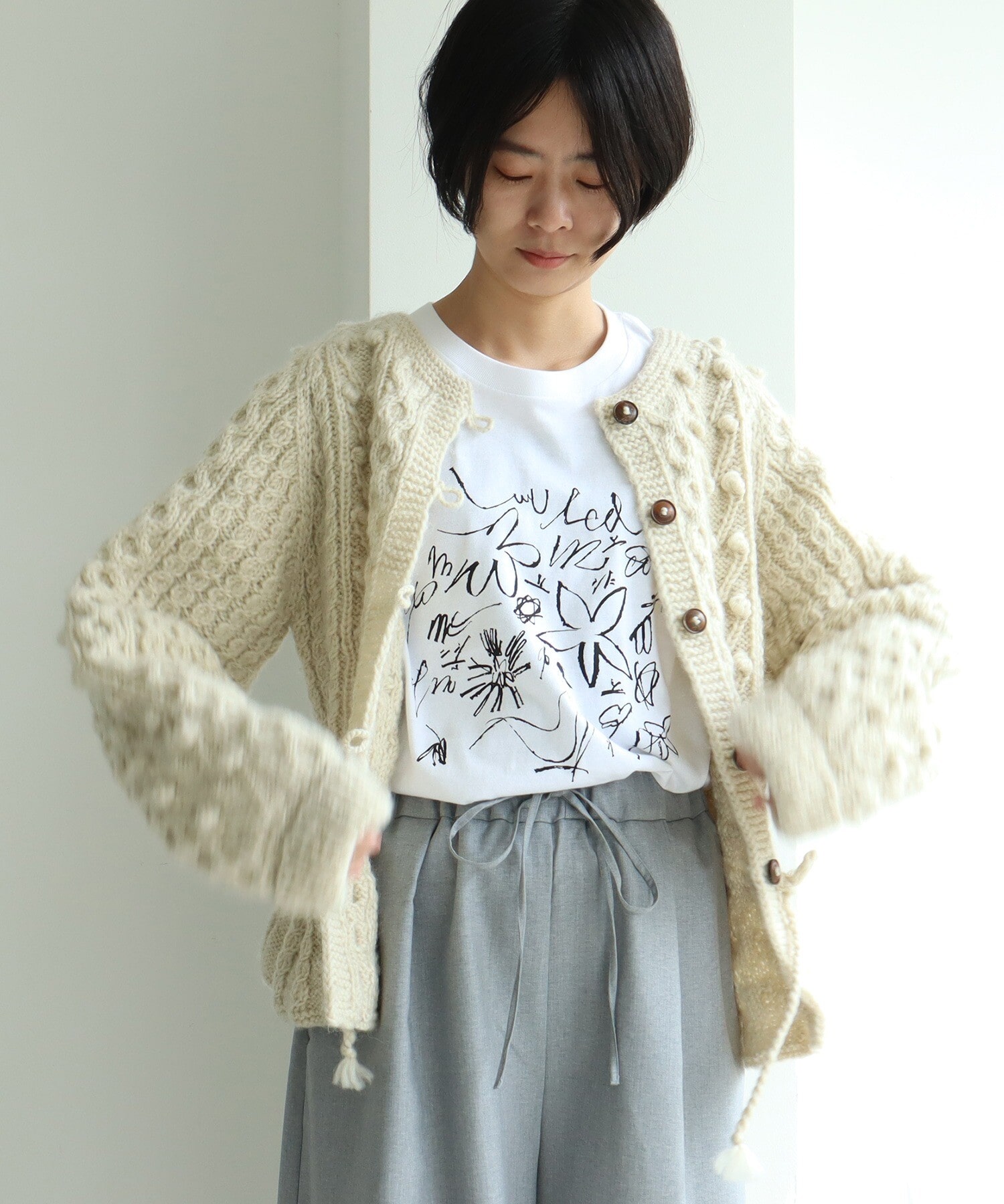 AMBIDEX Store ○ネパールハンドニット peplum カーディガン(F クロ): yuni