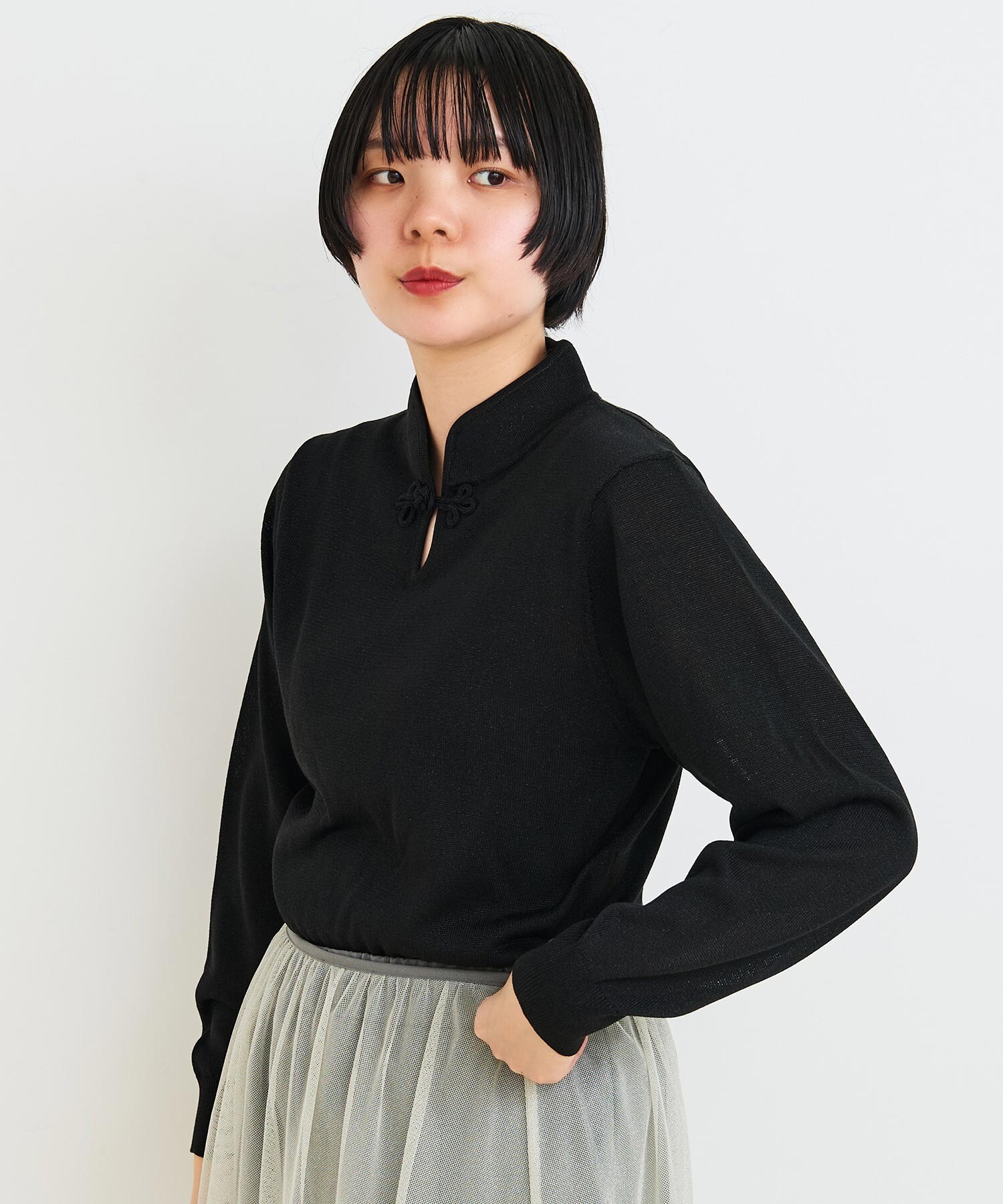 ケーブル編みプルオーバーニット